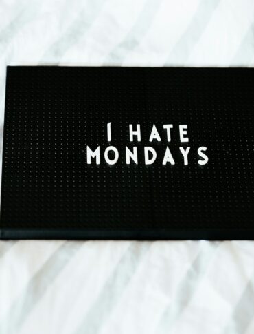 black i hate Mondays printed box on white textile